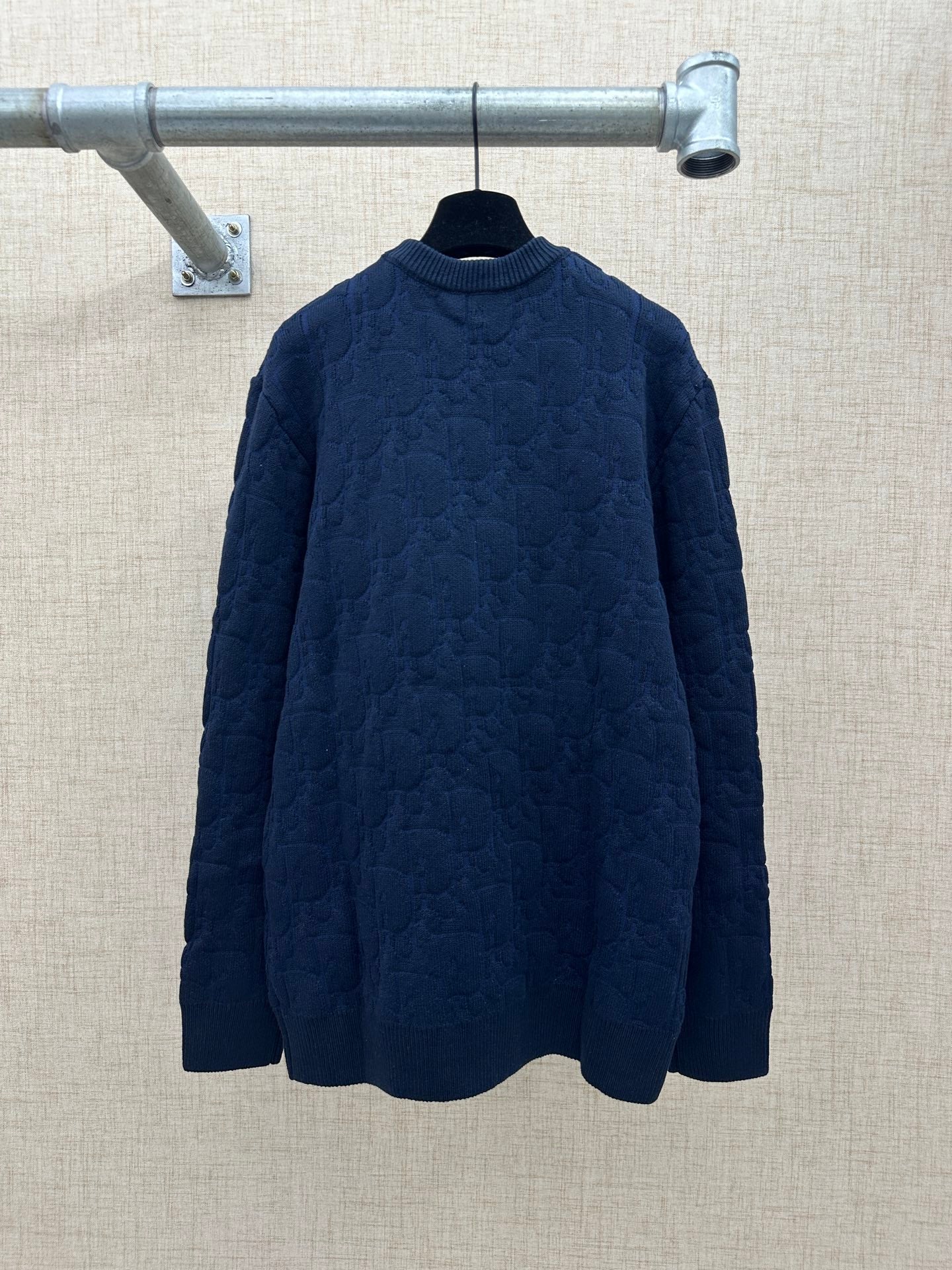 Navy long-sleeve knit sweater with ribbed crew neck, full front view