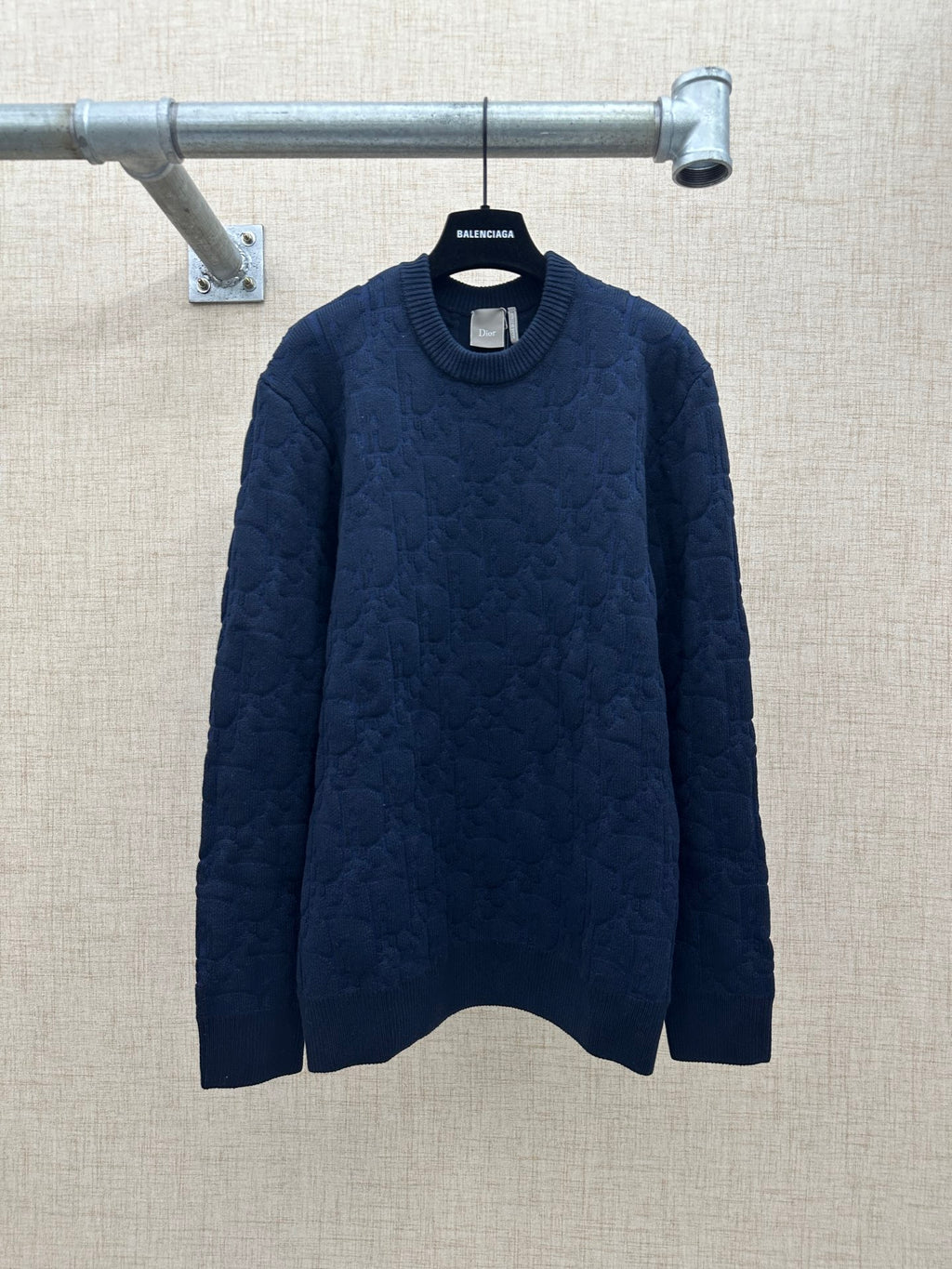 Navy long-sleeve knit sweater with ribbed crew neck