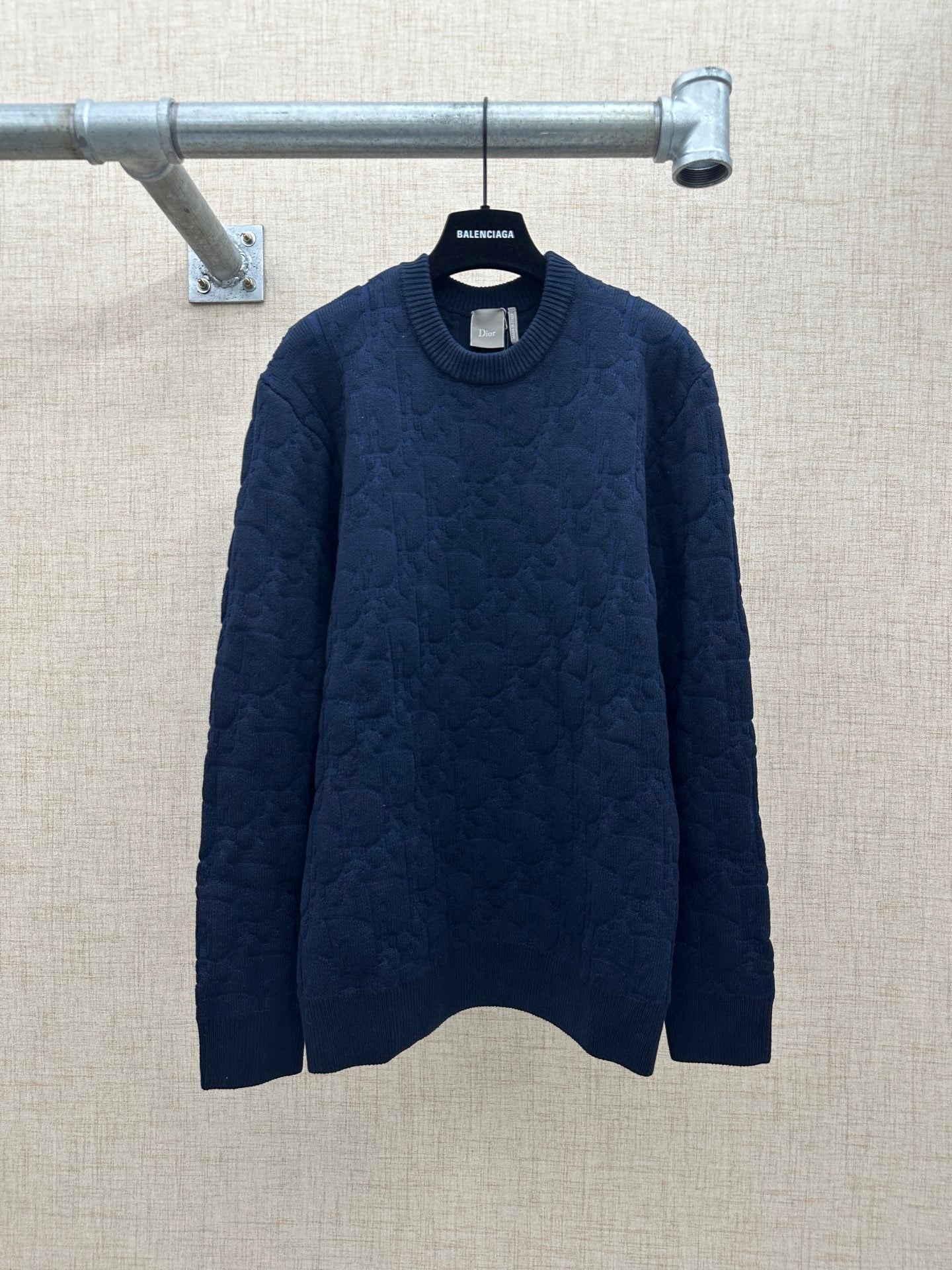 Navy long-sleeve knit sweater with ribbed crew neck