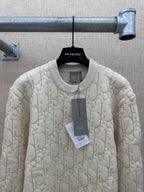 Cream knit sweater with allover logo pattern, crew neck, with hanging tag