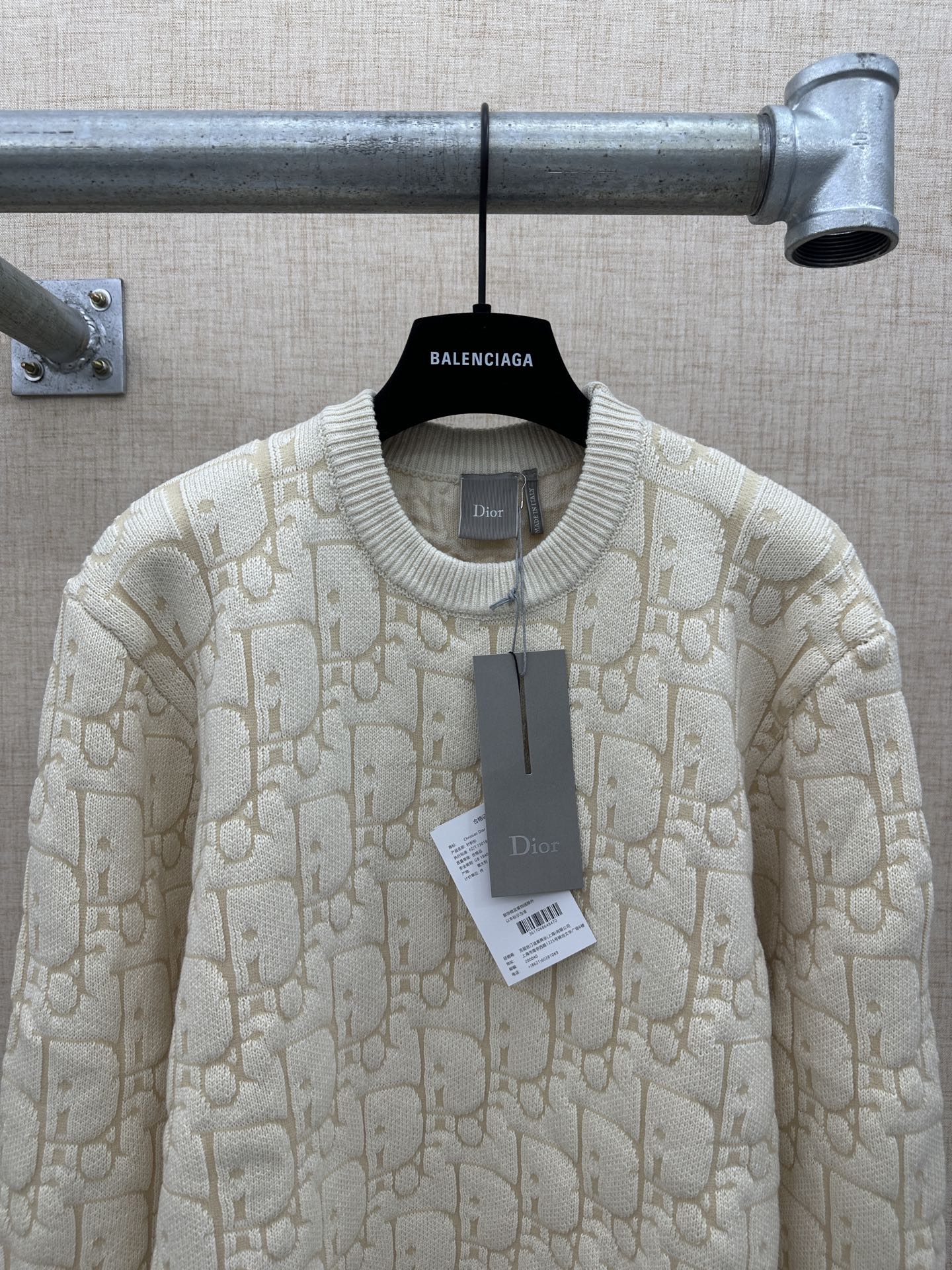 Cream knit sweater with allover logo pattern, crew neck, with hanging tag