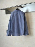 Long-sleeve striped button-up shirt, blue and white vertical stripes, full back view