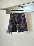 Louis Vuitton patterned shorts on hanger, front view, blue and orange camo print