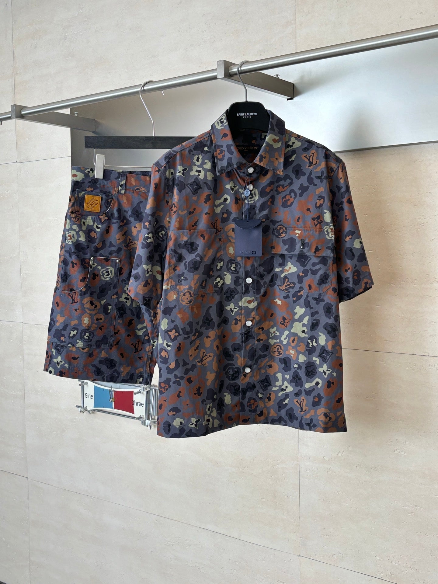 Louis Vuitton short-sleeve shirt with multicolor camo print and button-front closure