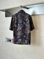 Short-sleeve shirt with multicolor camo print, back view