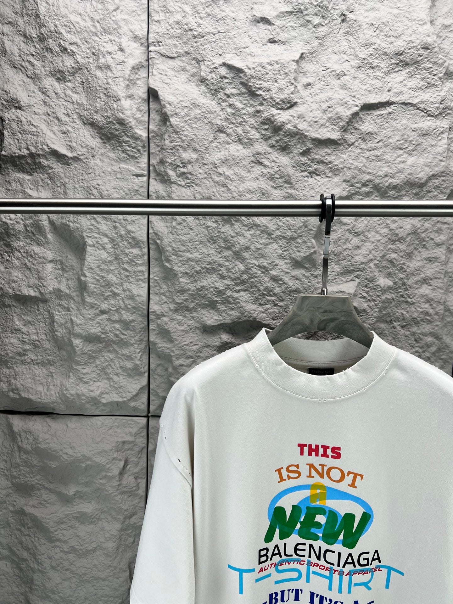 Balenciaga T-shirt in white with multicolor front “THIS IS NOT NEW” graphic