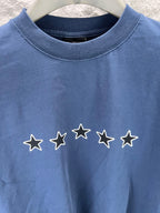 Blue short-sleeve T-shirt with crew neck and five-star row graphic