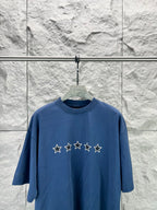 Blue short-sleeve T-shirt with star graphic across the front
