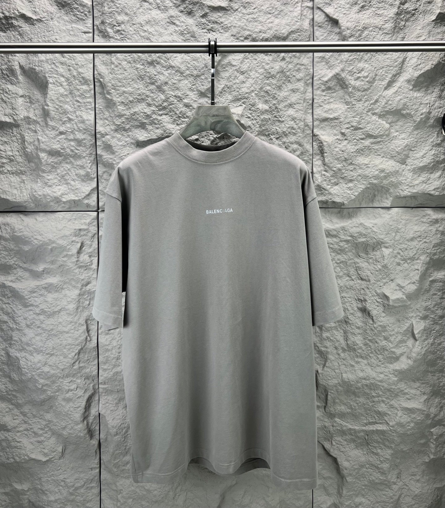 Light gray crewneck T-shirt on hanger, long sleeves, small BALENCIAGA logo