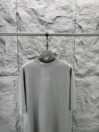 Light gray crewneck T-shirt on hanger, long sleeves, small BALENCIAGA logo