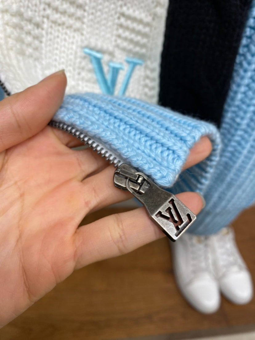 Louis Vuitton sweater zipper with metal pull and light-blue ribbed trim