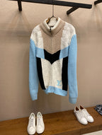 Louis Vuitton long-sleeve knit sweater with cream, black, and light-blue color blocks