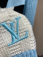 Louis Vuitton knit sweater sleeve with light-blue embroidered letter motif