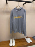 Gray Louis Vuitton pullover hoodie with hood and front logo script, long sleeves