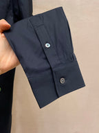 Fendi long-sleeve button-up shirt cuff with two dark navy buttons