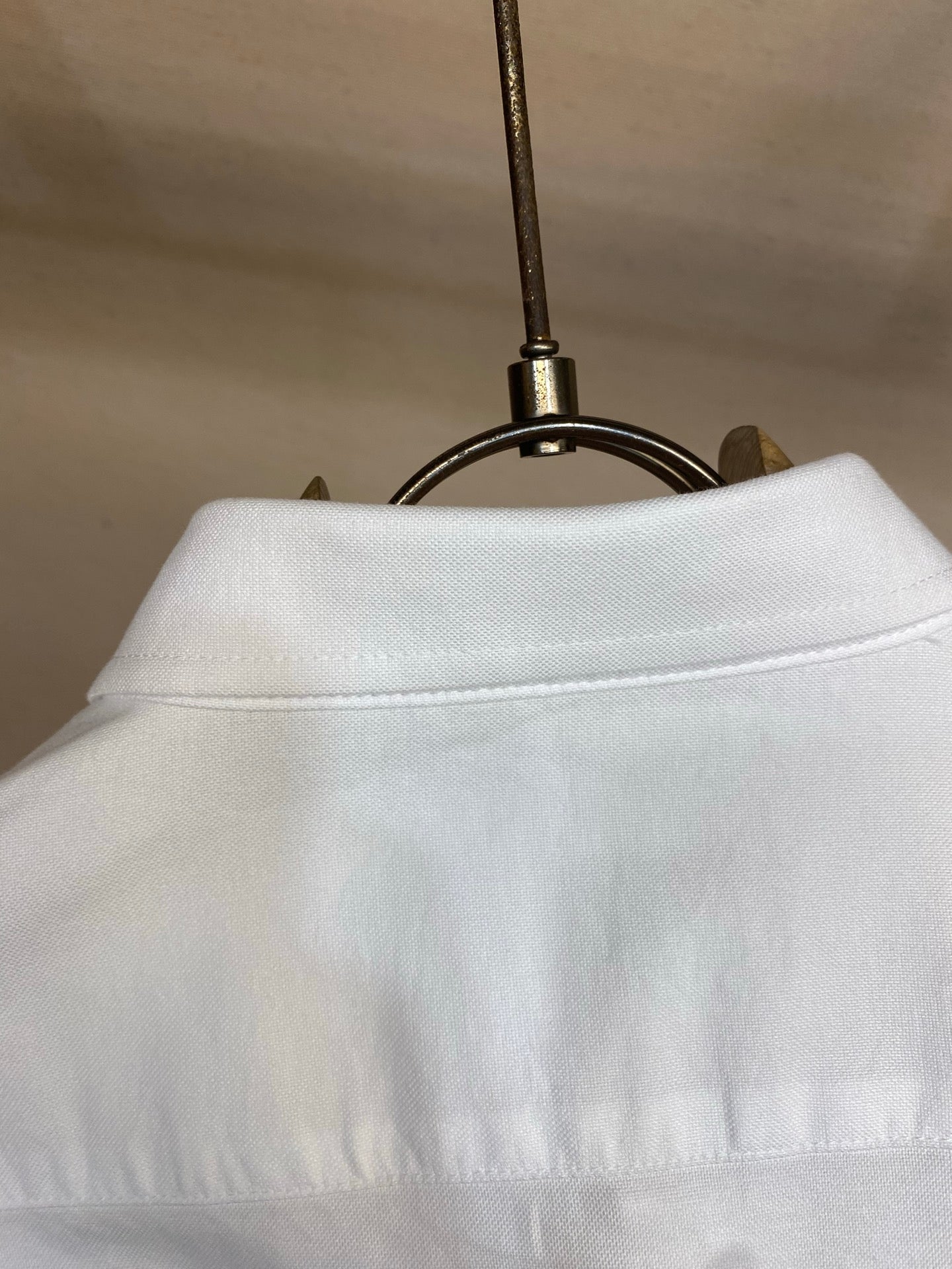 Amiri button-up shirt in white, high collar and neckline seam close-up