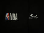 Black pants side panel with NBA logo patch and Balenciaga logo
