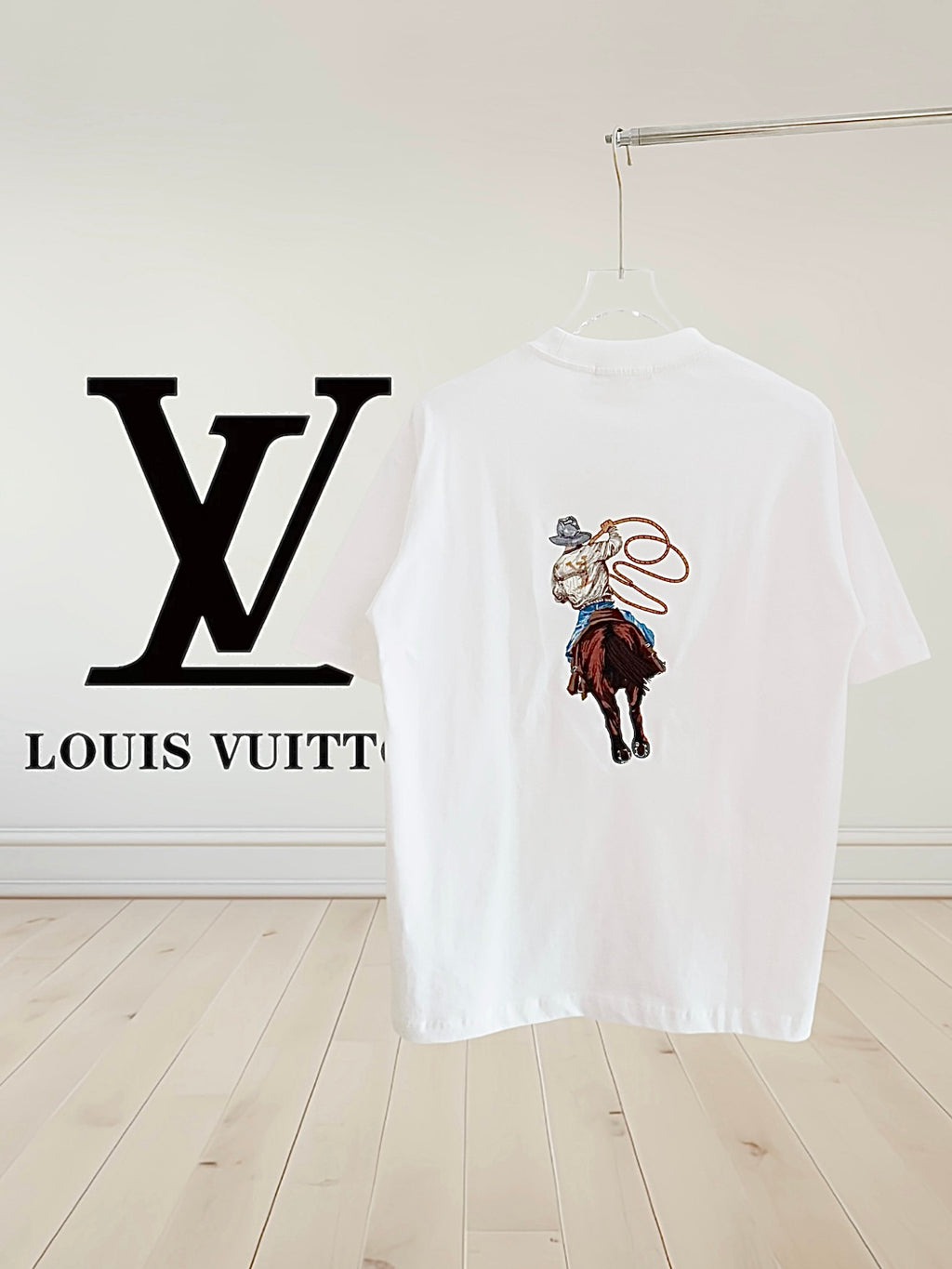 White Louis Vuitton short-sleeve T-shirt with colorful rider graphic on back