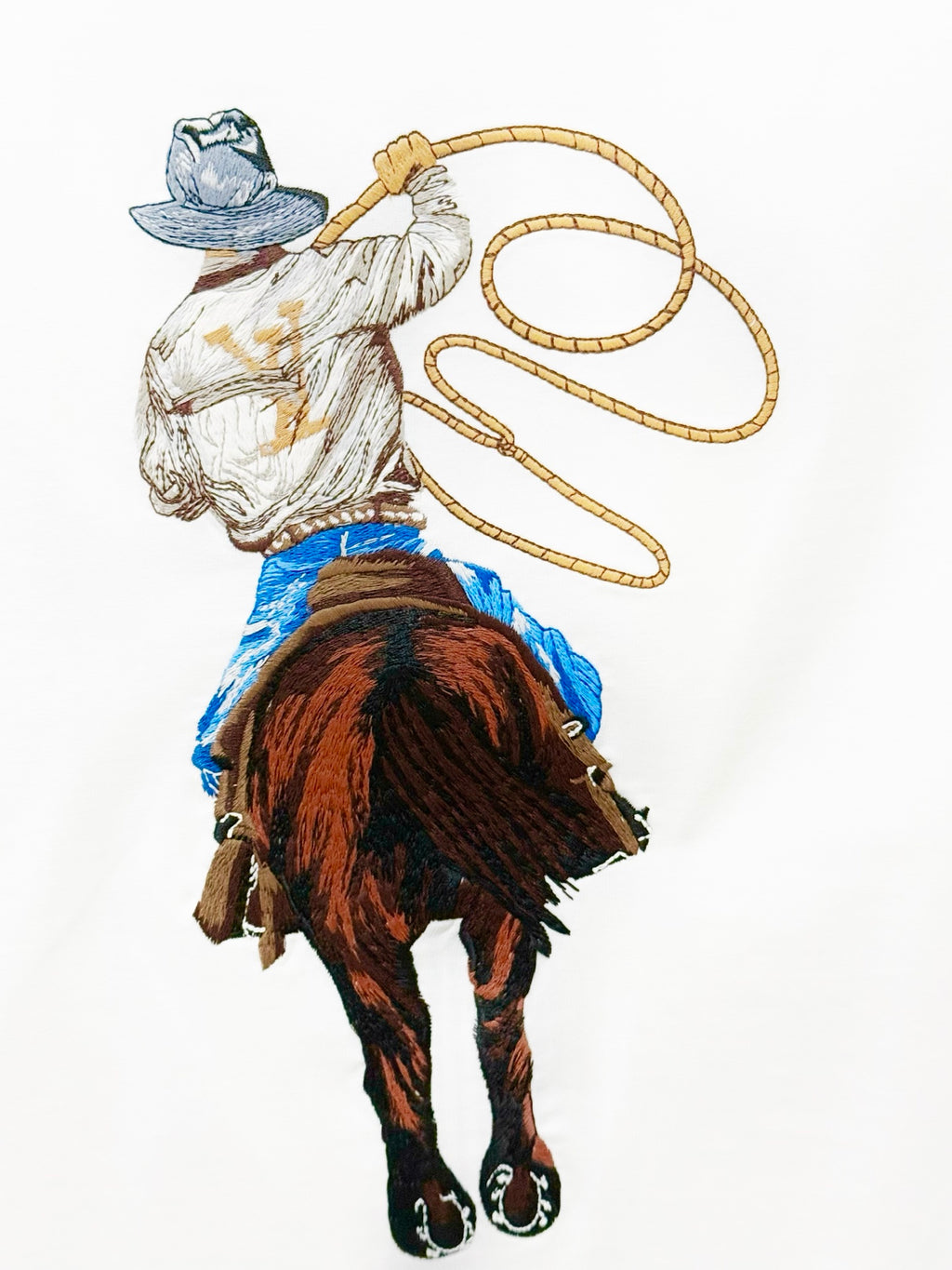 White Louis Vuitton T-shirt with cowboy-horse rider graphic in blue and brown
