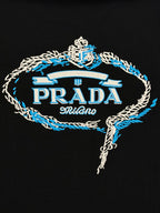 Black Prada Milano T-shirt with blue crest embroidered logo across chest