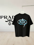 Prada Milano black short-sleeve T-shirt with large blue and white oval logo graphic