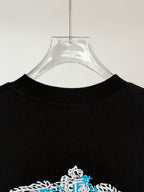 Prada Milano black T-shirt back neckline with partial white-and-blue crest graphic