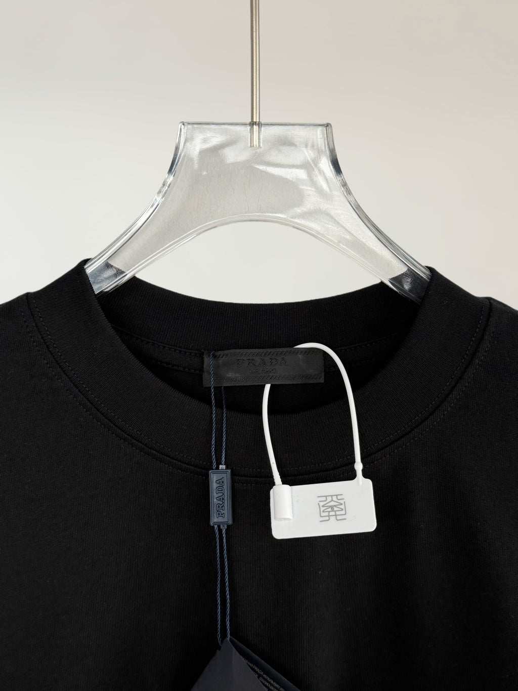 Prada Milano black T-shirt neckline with hang tag and inner collar seam