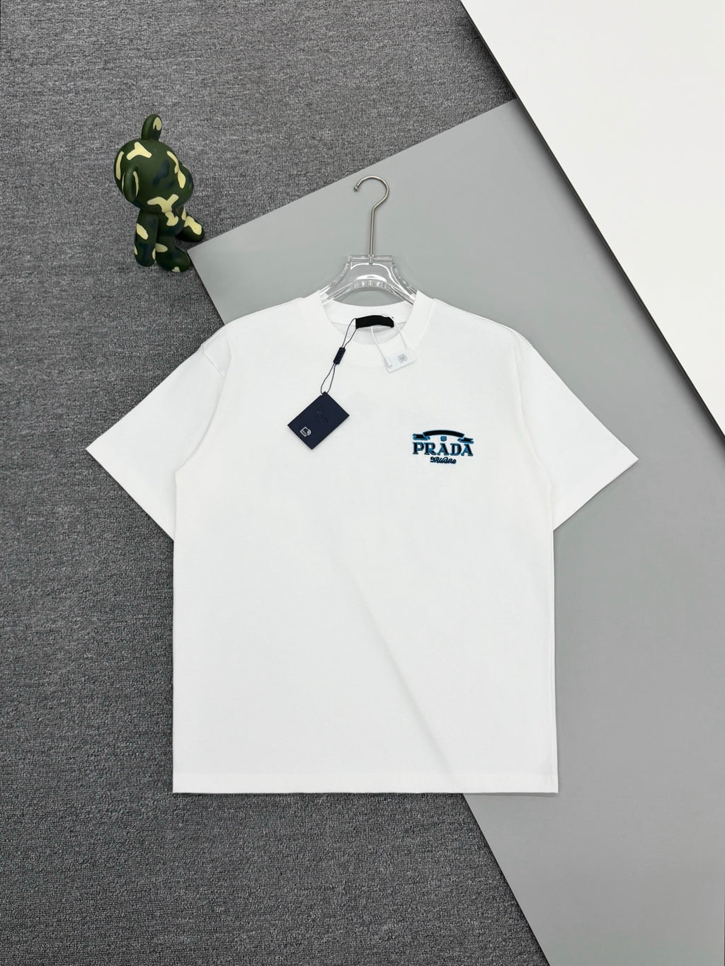 White short-sleeve T-shirt with small PRADA logo at chest