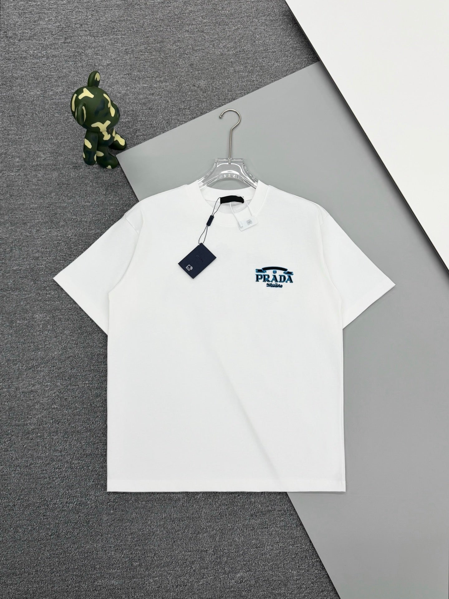 White short-sleeve T-shirt with small PRADA logo at chest