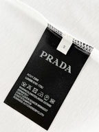 Prada T-shirt care label and size tag on inside seam