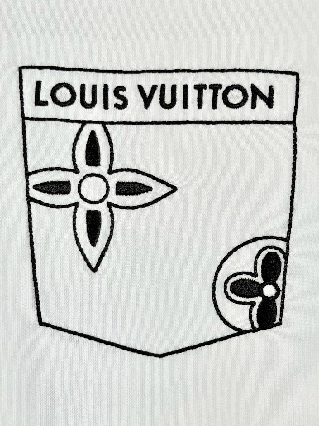White T-shirt pocket logo graphic with Louis Vuitton text and hearts