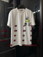 White Dior short-sleeve T-shirt with size measurement chart overlay and logos