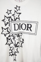 White short-sleeve T-shirt front with large black Dior logo and starburst print