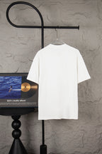 White short-sleeve T-shirt hanging on a rack, plain back view