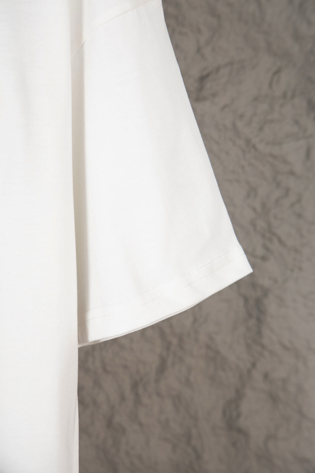 White Louis Vuitton T-shirt side view with relaxed seam and short sleeve