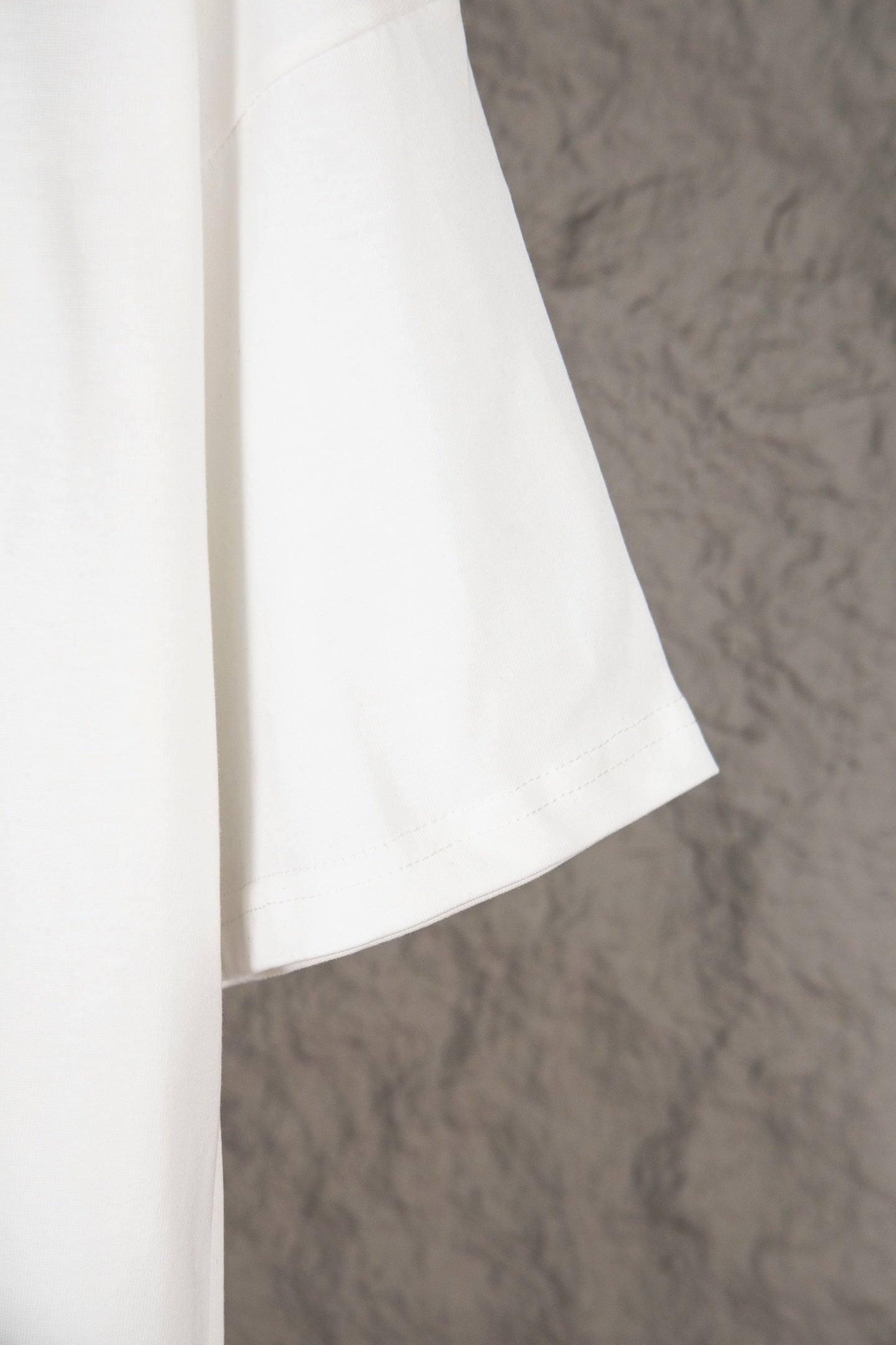 White Louis Vuitton T-shirt side view with relaxed seam and short sleeve