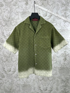 Gucci green short-sleeve button-up shirt with allover monogram pattern and pockets