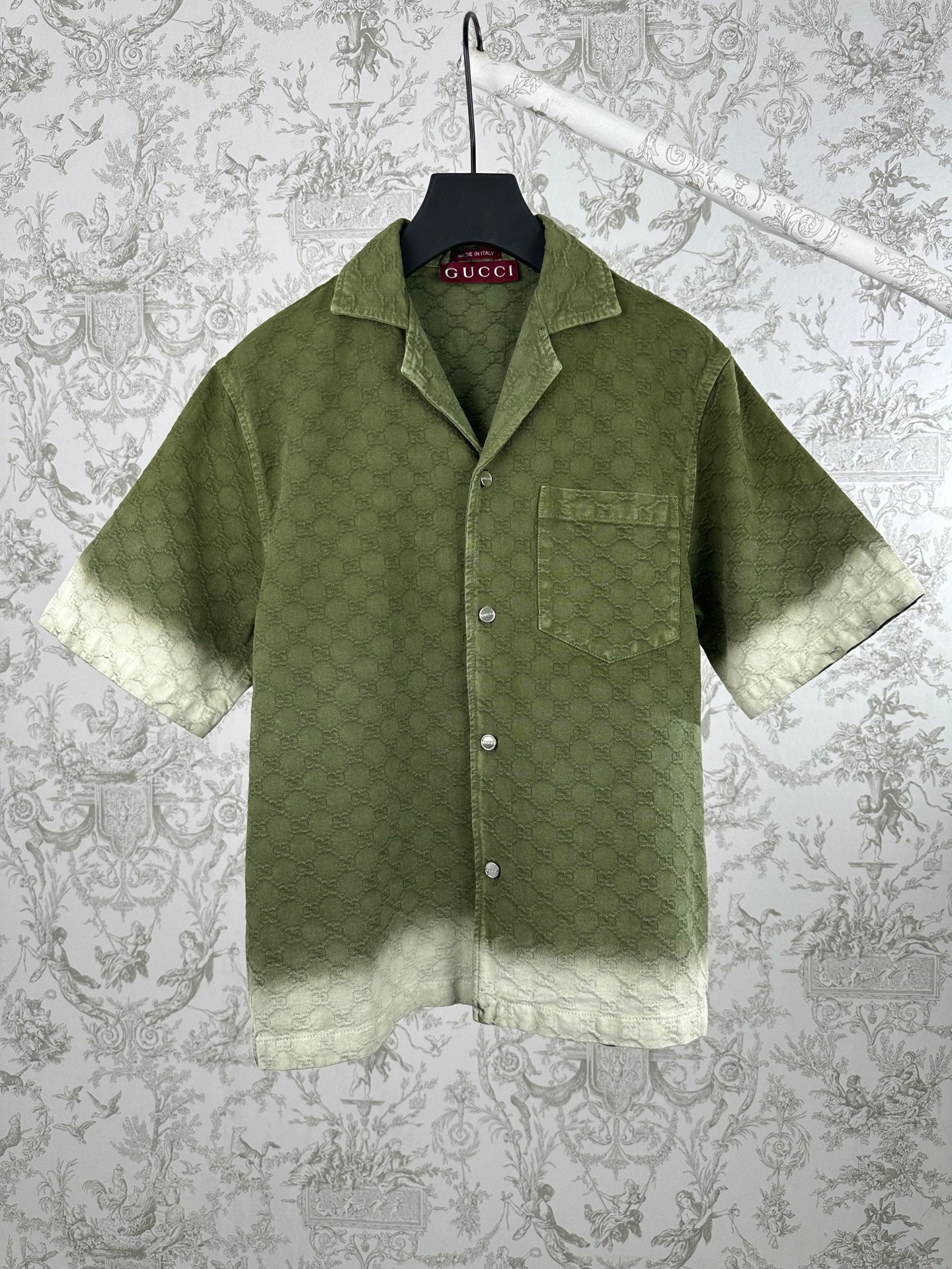 Gucci green short-sleeve button-up shirt with allover monogram pattern and pockets
