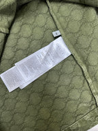 Gucci green short-sleeve shirt with care/size label on inner seam
