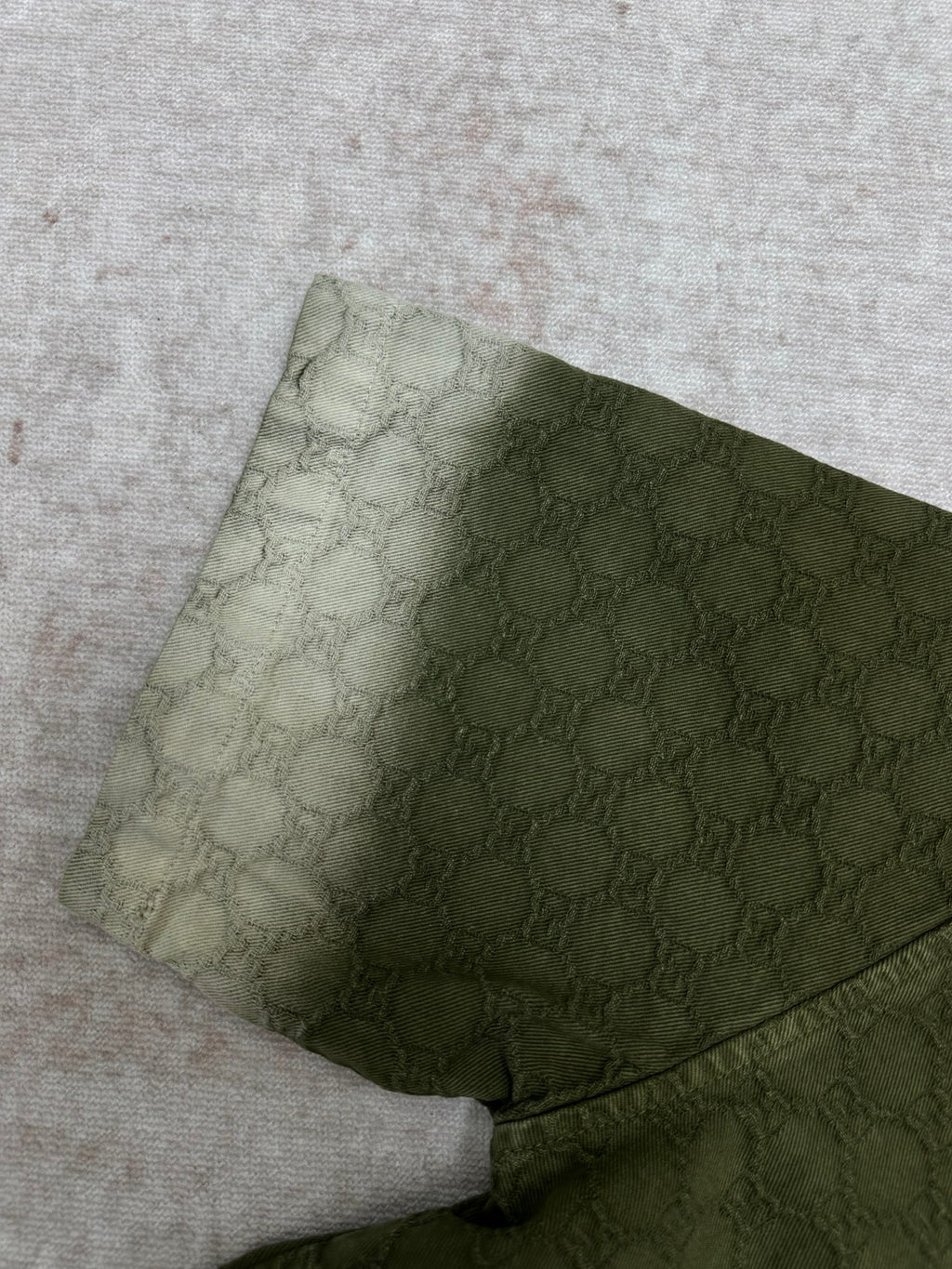 Gucci green shorts with allover monogram pattern, folded hem detail