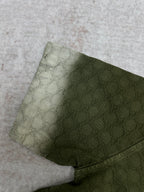 Gucci green shorts with allover monogram pattern, folded hem detail