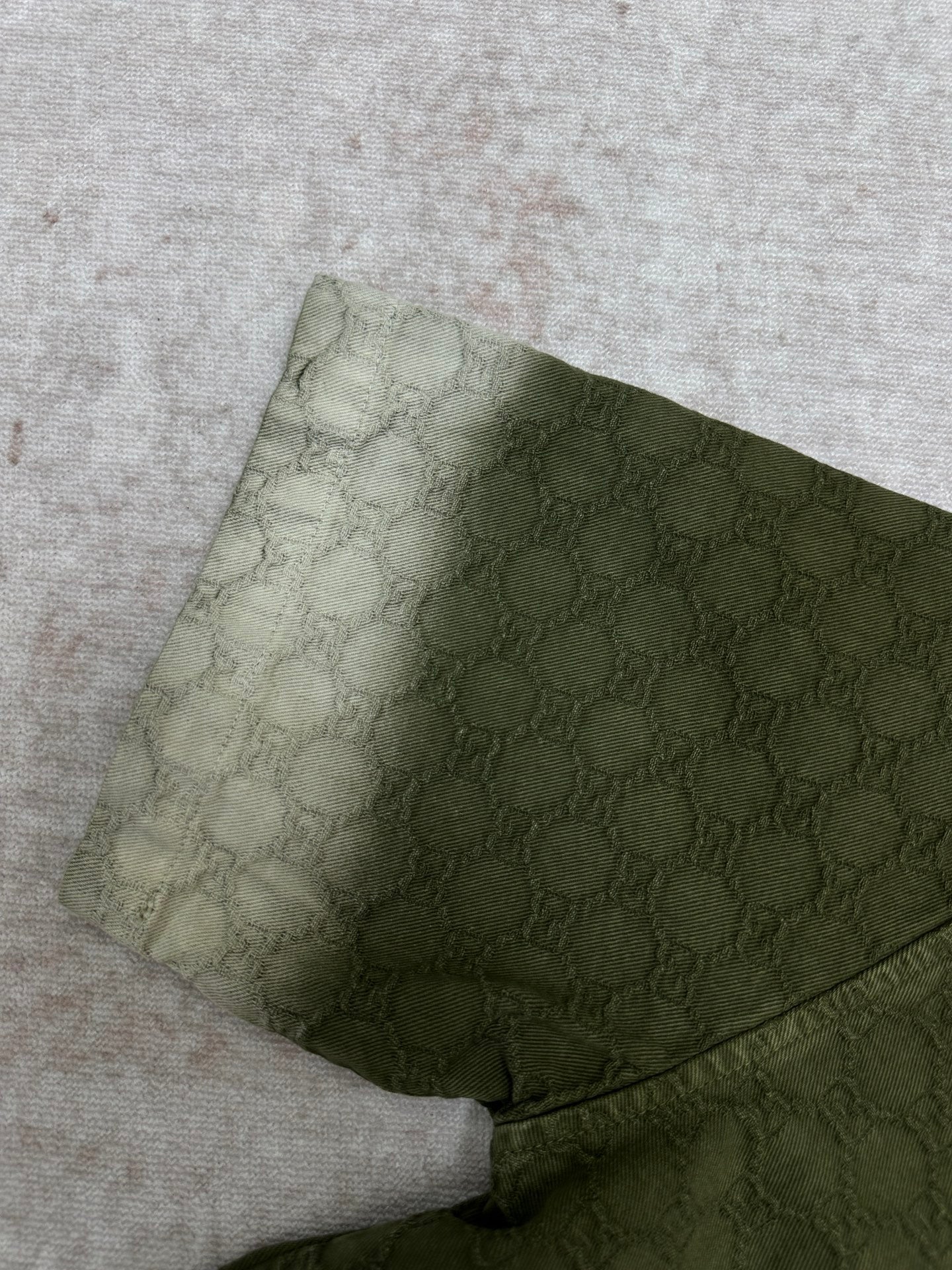 Gucci green shorts with allover monogram pattern, folded hem detail