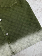 Gucci green shorts side view with pocket and allover monogram pattern