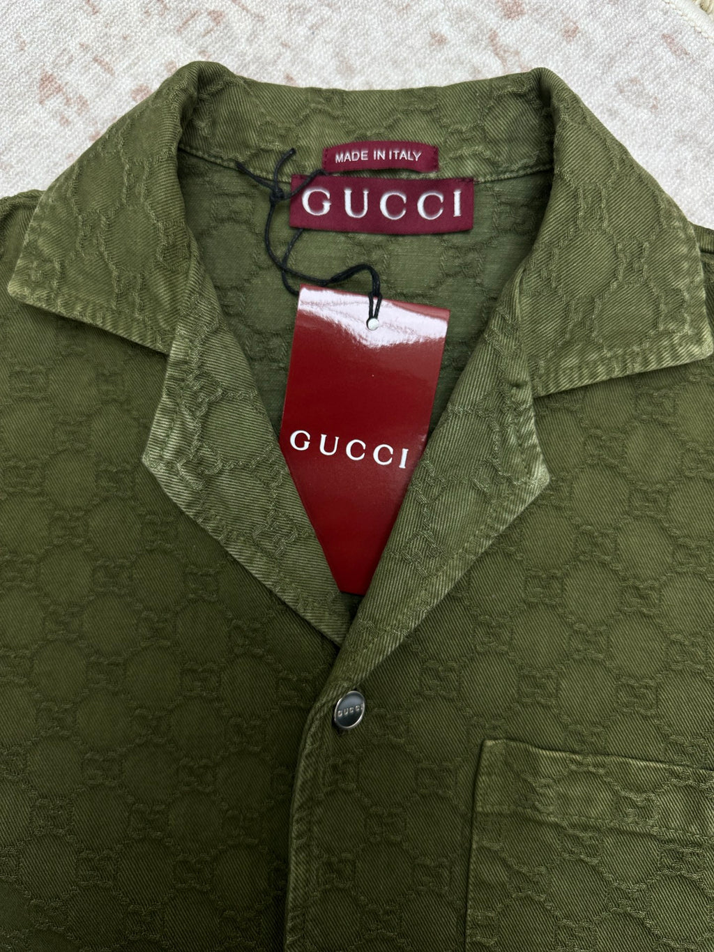 Gucci green short-sleeve button-up shirt with collar, allover monogram and Made in Italy label