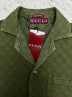 Gucci green short-sleeve button-up shirt with collar, allover monogram and Made in Italy label