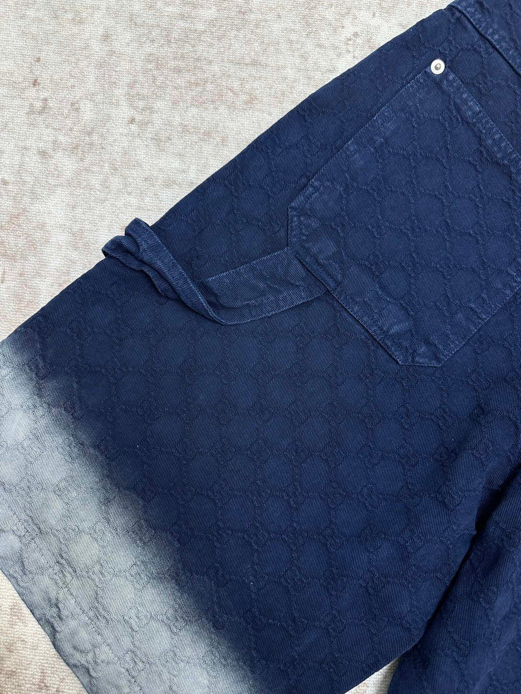 Blue monogram shorts with front pocket flap and drawstring waist