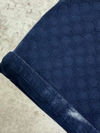 Blue monogram shorts with textured fabric and light faded hem
