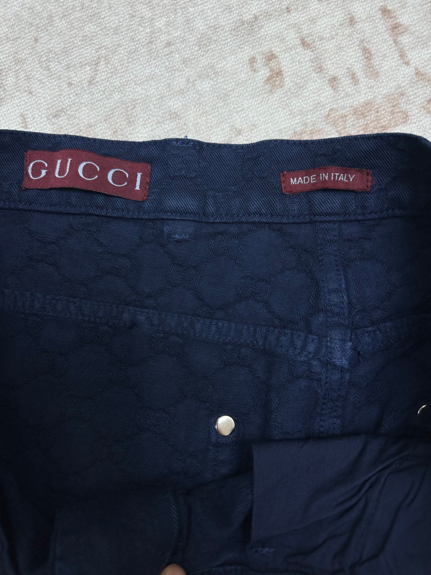 Blue monogram shorts with Gucci label and Made in Italy waistband tag
