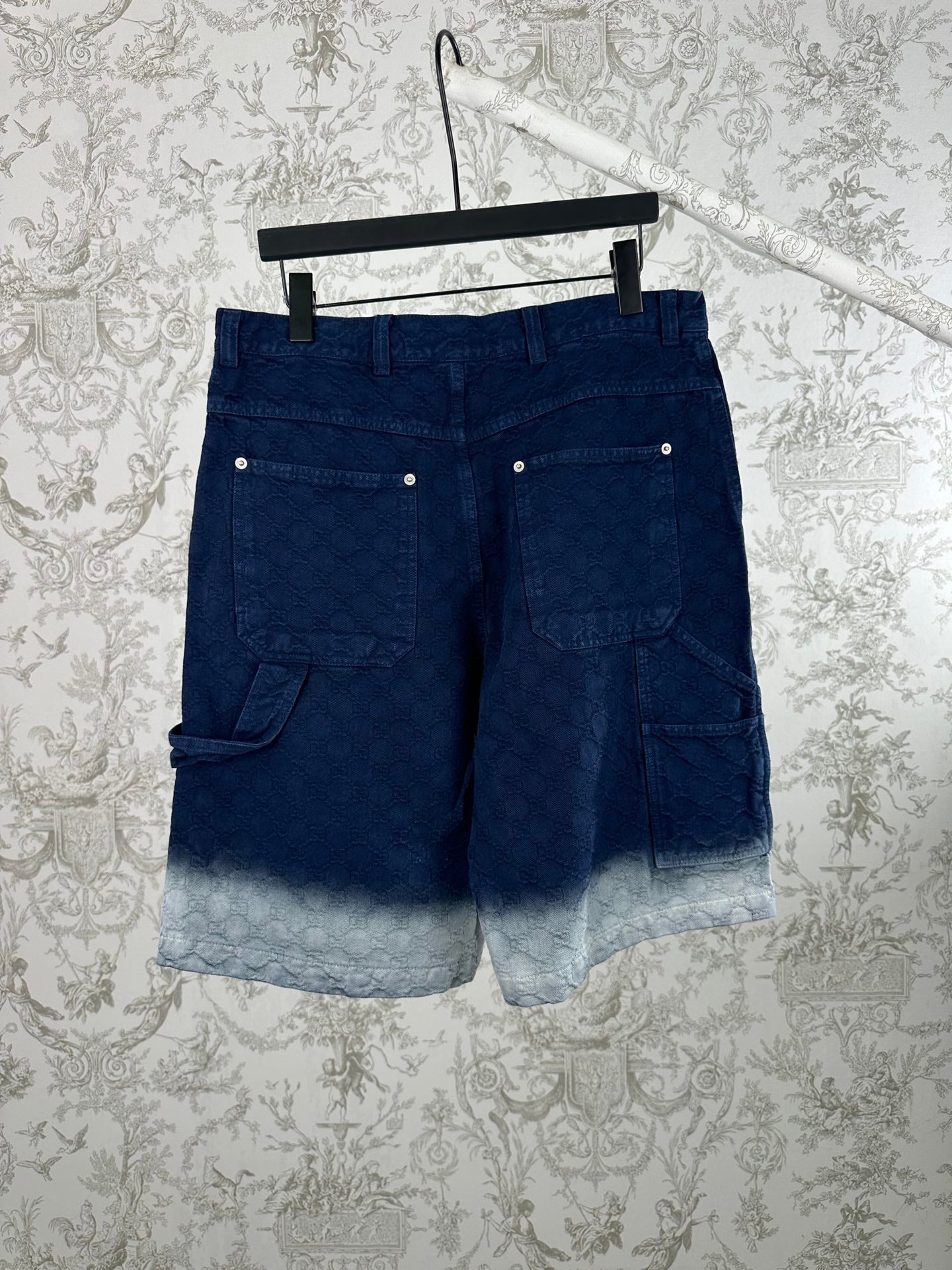 Blue monogram shorts with back flap pockets and dark waistband