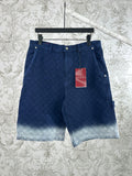 Blue monogram shorts with front button closure and light faded hem